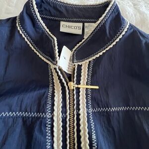 Chicos Navy blue waterproof. windbreaker.  XL.  New with tag on. Zipper front.